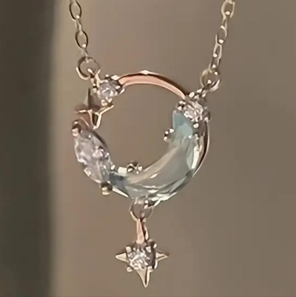 Elegant Silver and Blue Crescent Necklace